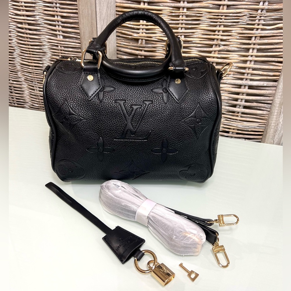 Style Elevating Fashion Bag Perfect for Everyday use – Black with Red Interior.
